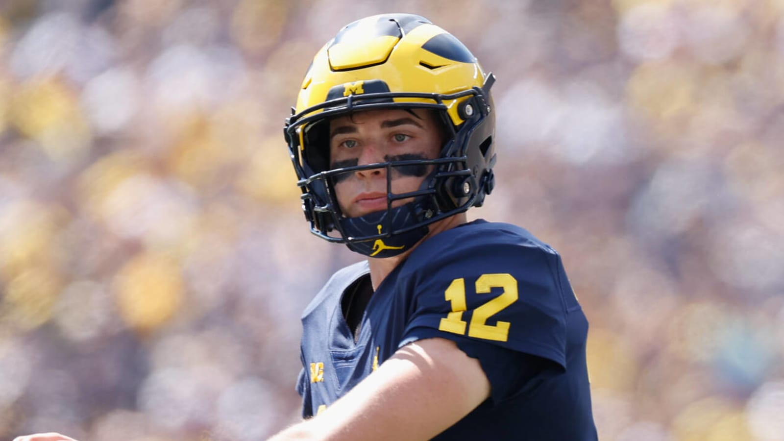 Father of Michigan QB Cade McNamara calls for reporter to share source over transfer rumor