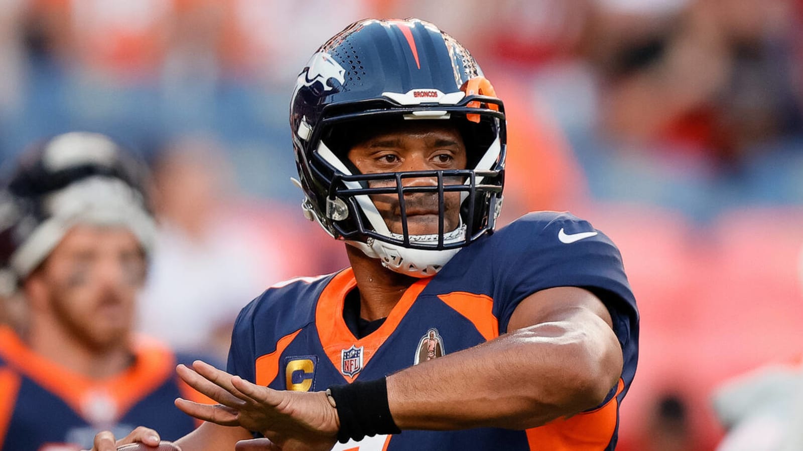 Broncos QB Russell Wilson builds his brand with a charm offensive in Denver  - Axios Denver