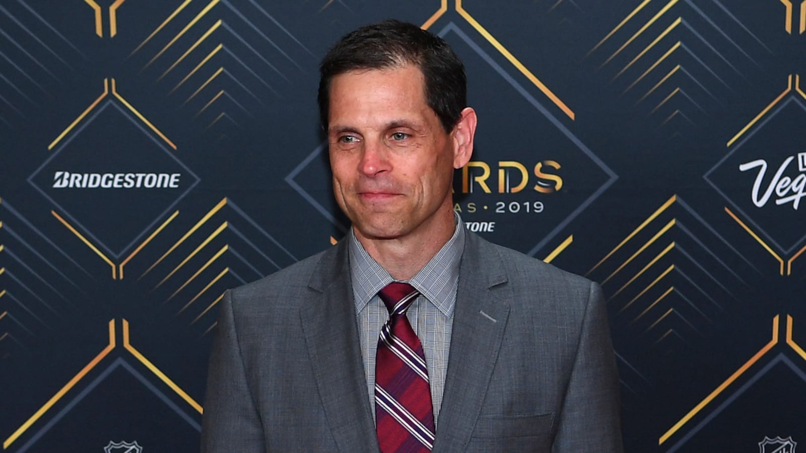 Three general managers at the Rocket game