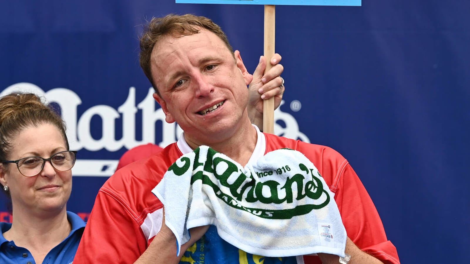 Joey Chestnut wins 16th hot dog eating contest after lightning delay
