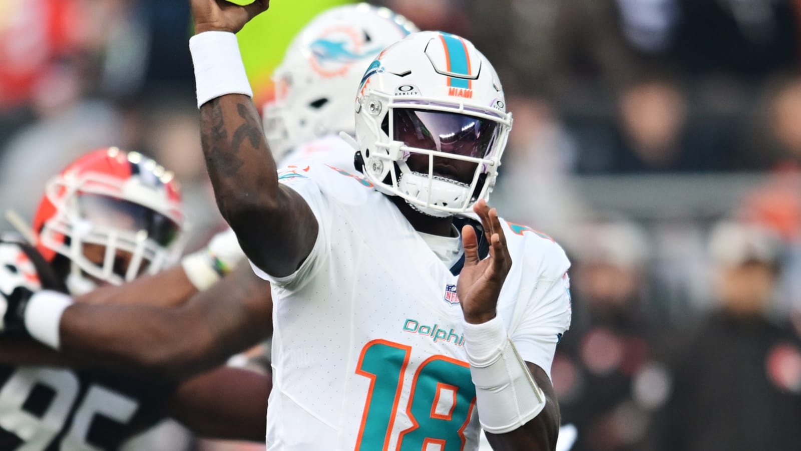 Short-handed Dolphins maintain slim playoff hopes