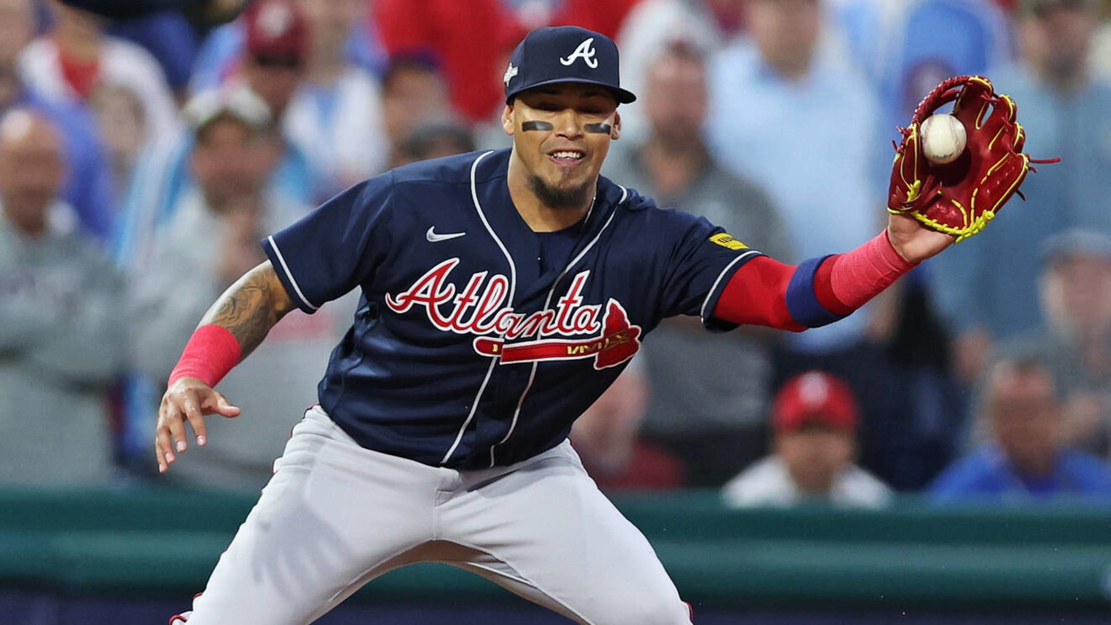 Orlando Arcia of the Atlanta Braves laughs during the Gatorade