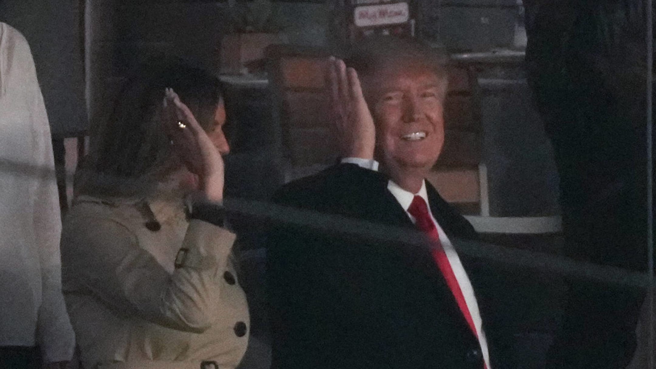 Donald Trump does tomahawk chop with Braves fans at World Series