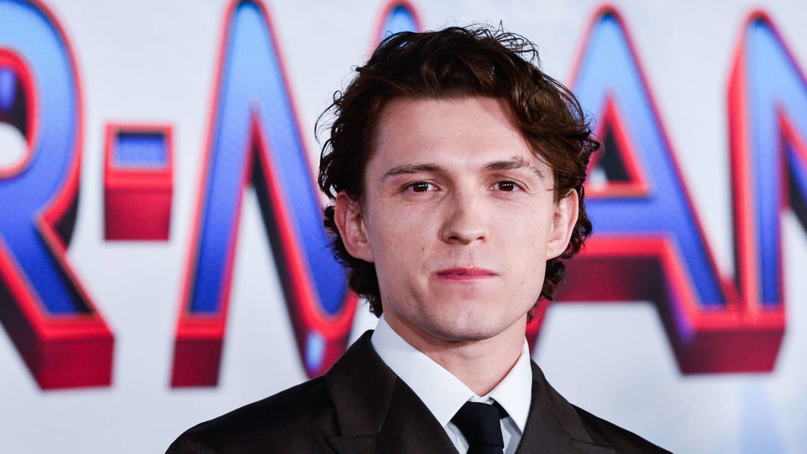 Tom Holland is happy he doesn't have to lie about 'Spider-Man: No Way Home' anymore