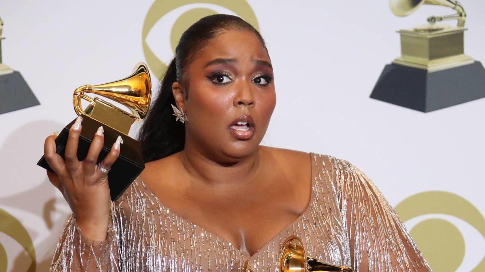 Chris Evans tells Lizzo there's 'no shame in a drunk DM' after singer shoots her shot