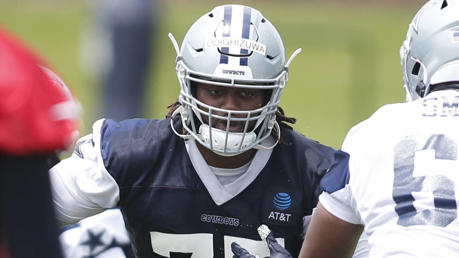 Cowboys sign third-round pick Osa Odighizuwa