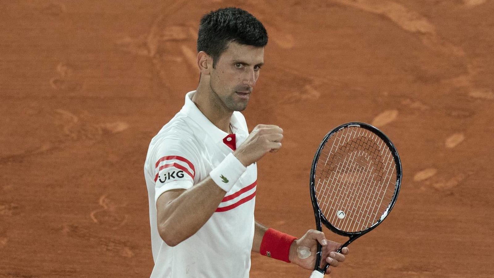 Djokovic gives racket to young fan after winning French Open