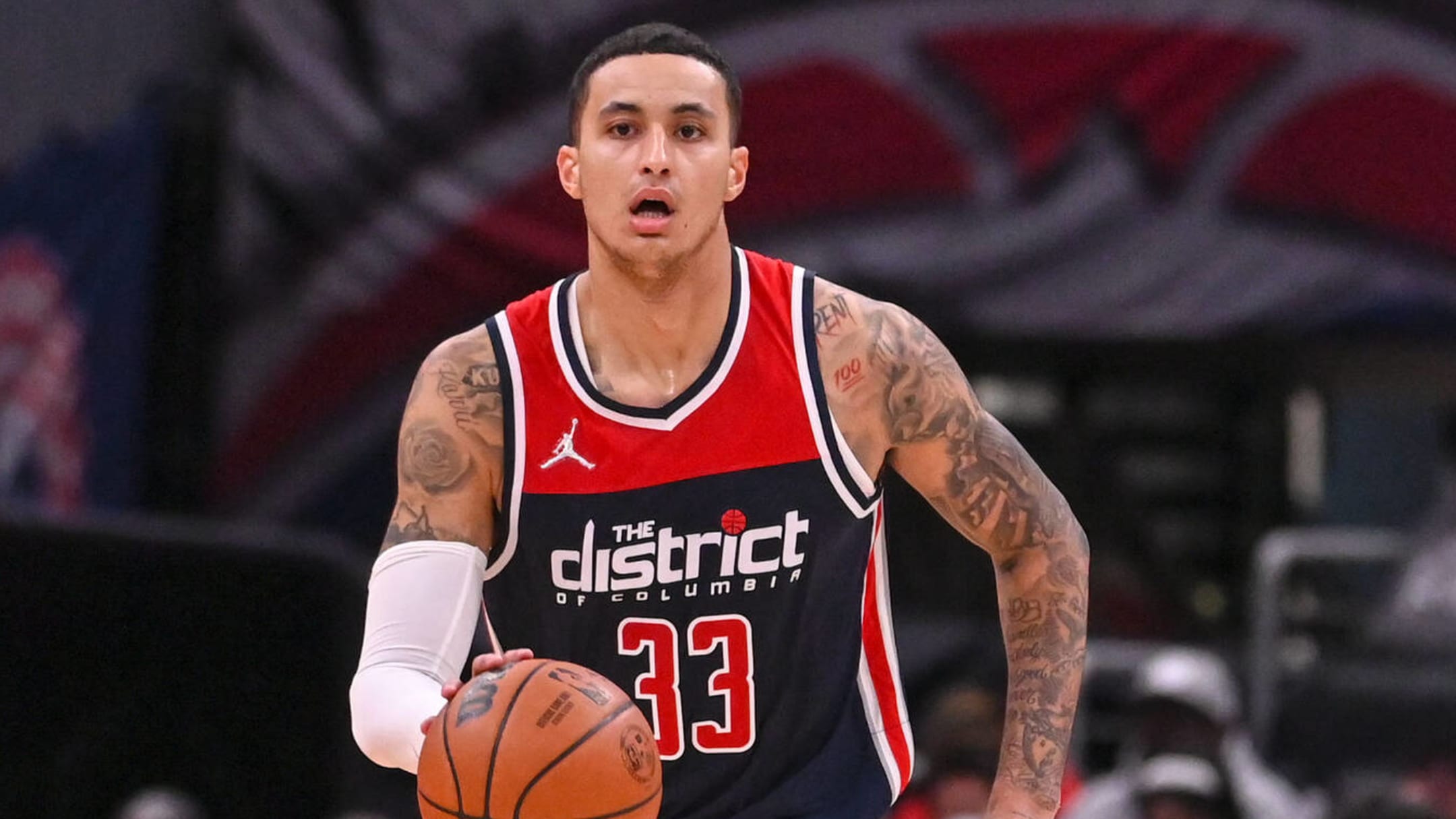 Wizards holding amazing Kyle Kuzma pink sweater bobblehead giveaway