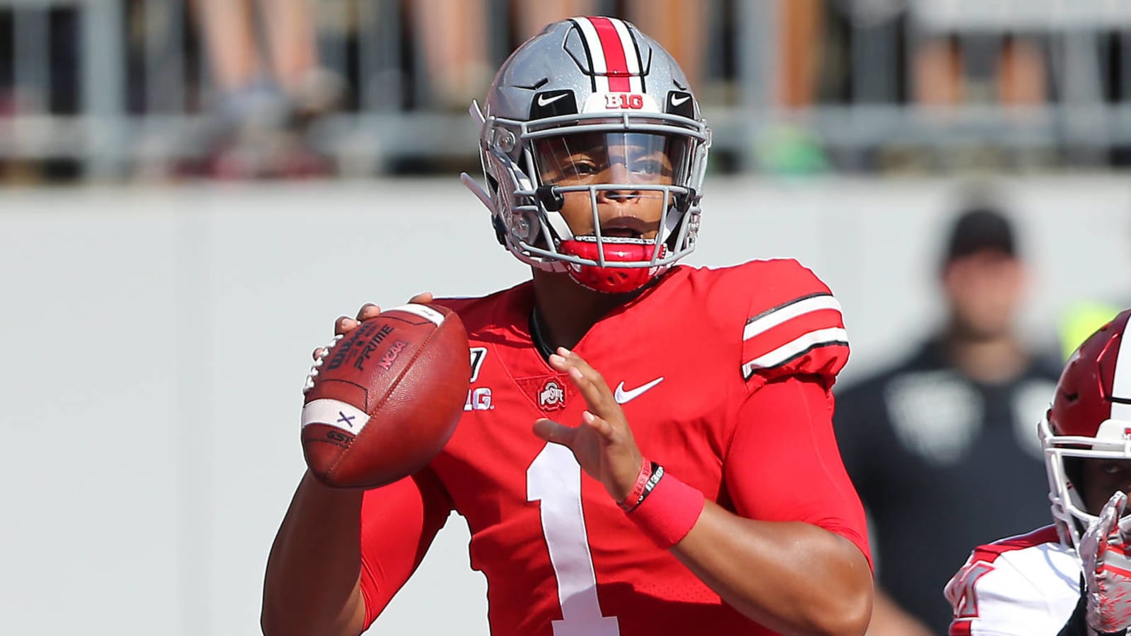 Ohio State QB Justin Fields checked out in medical tent for lower-back issue