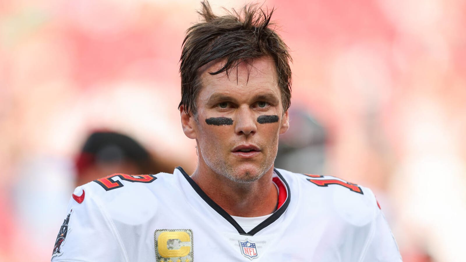 Tom Brady re-signs damaged American flag
