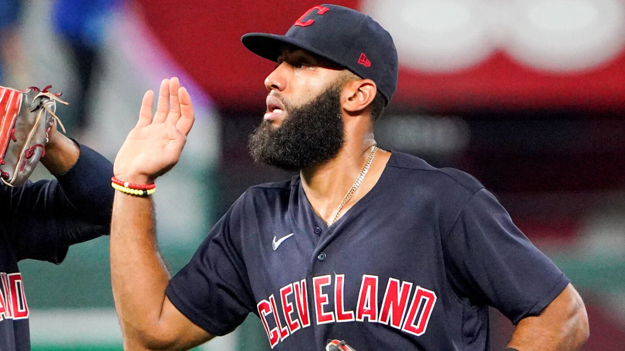 Cleveland Indians pitcher Zach Plesac catches the ball at first