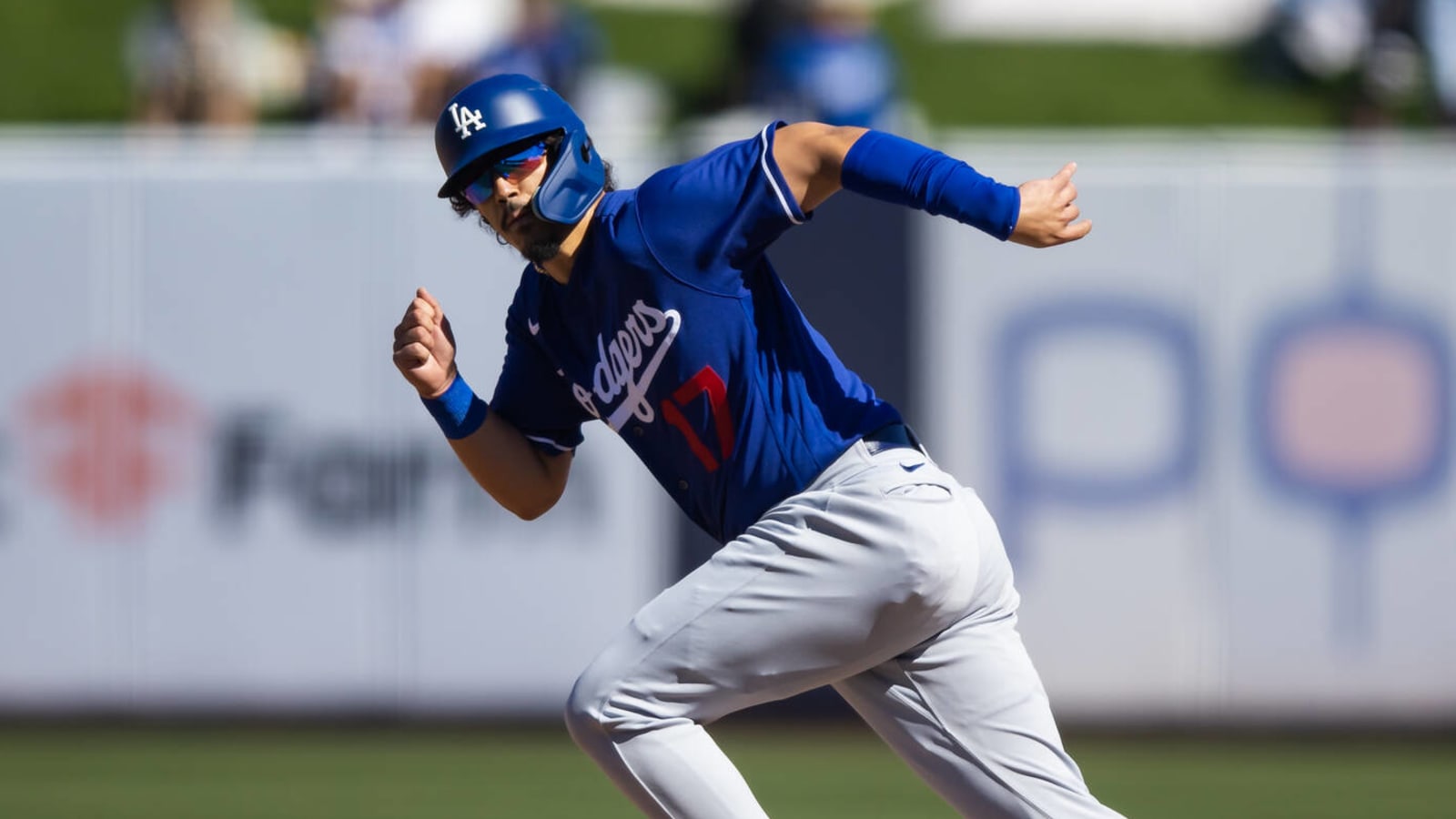 Dodgers second baseman keeps getting on base even though he is not allowed to swing the bat