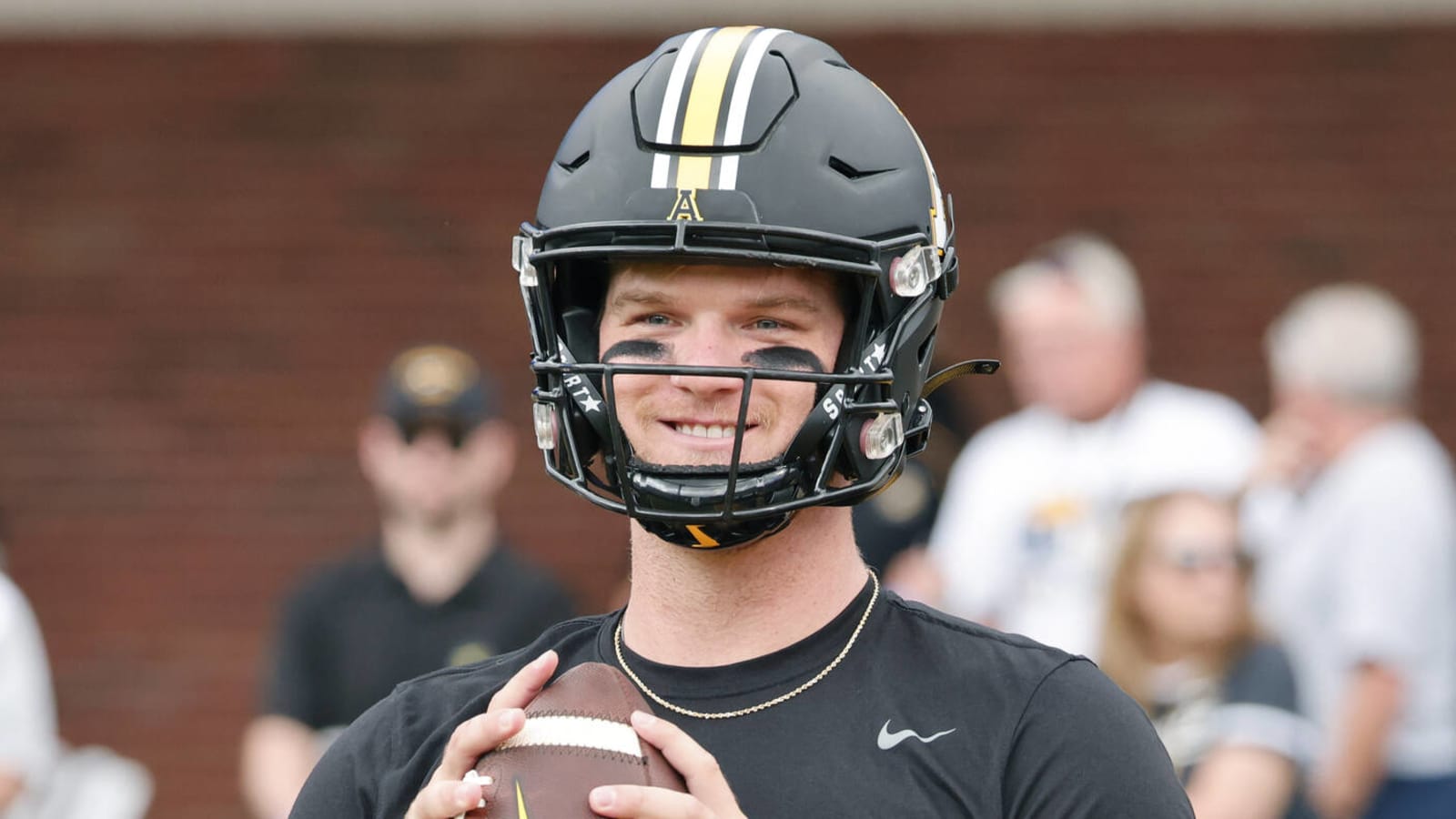 Watch: Appalachian State QB helped students rush field after Hail Mary