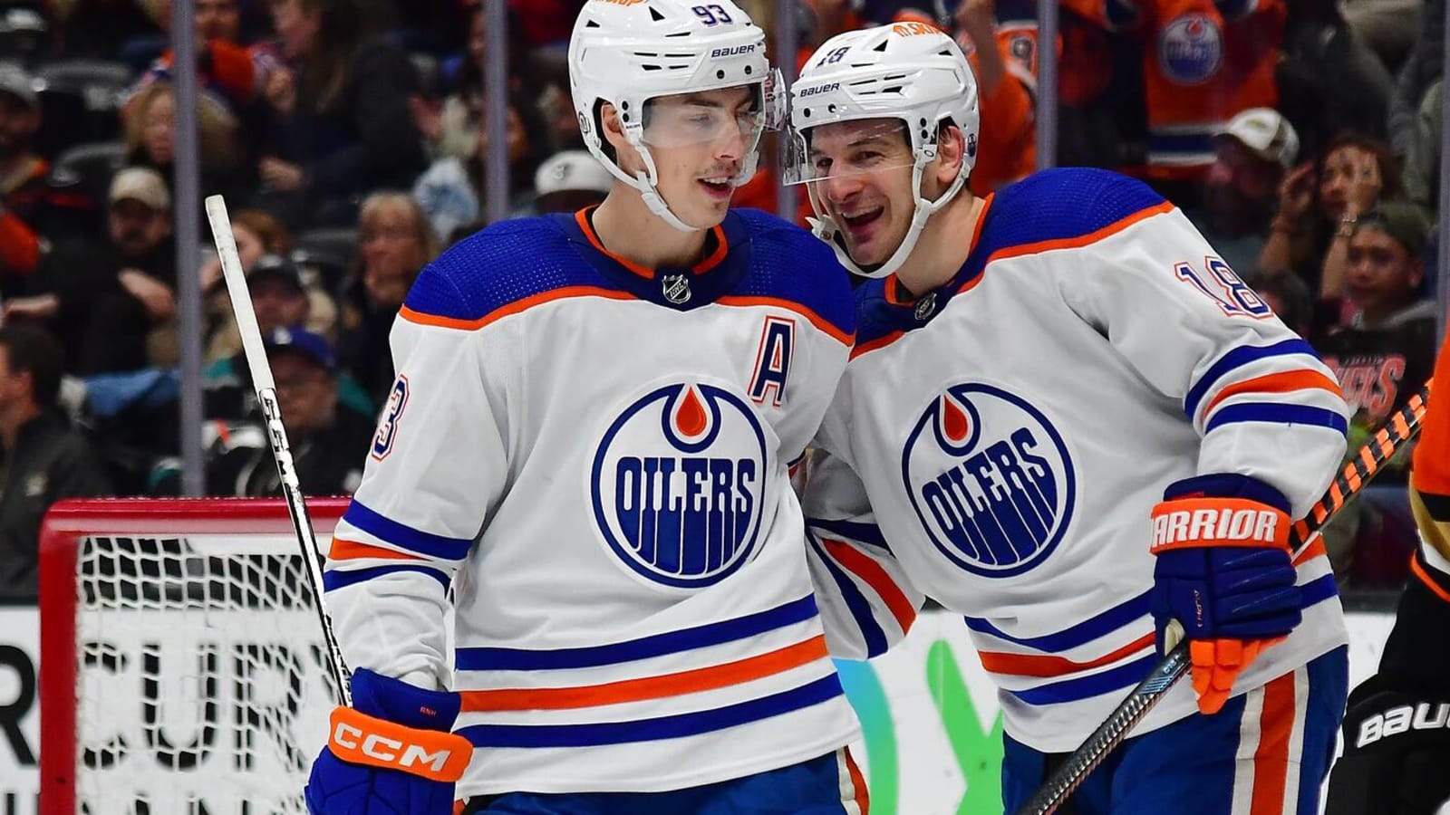 Ryan Nugent-Hopkins and Zach Hyman help dig stuck car out of the Edmonton snow