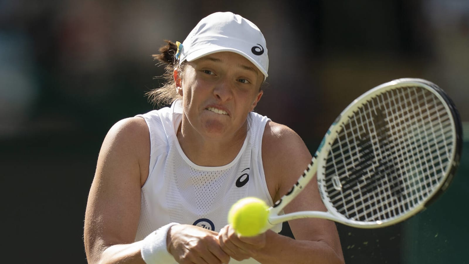 No. 1 Swiatek upset at Wimbledon, ending 37-match win streak