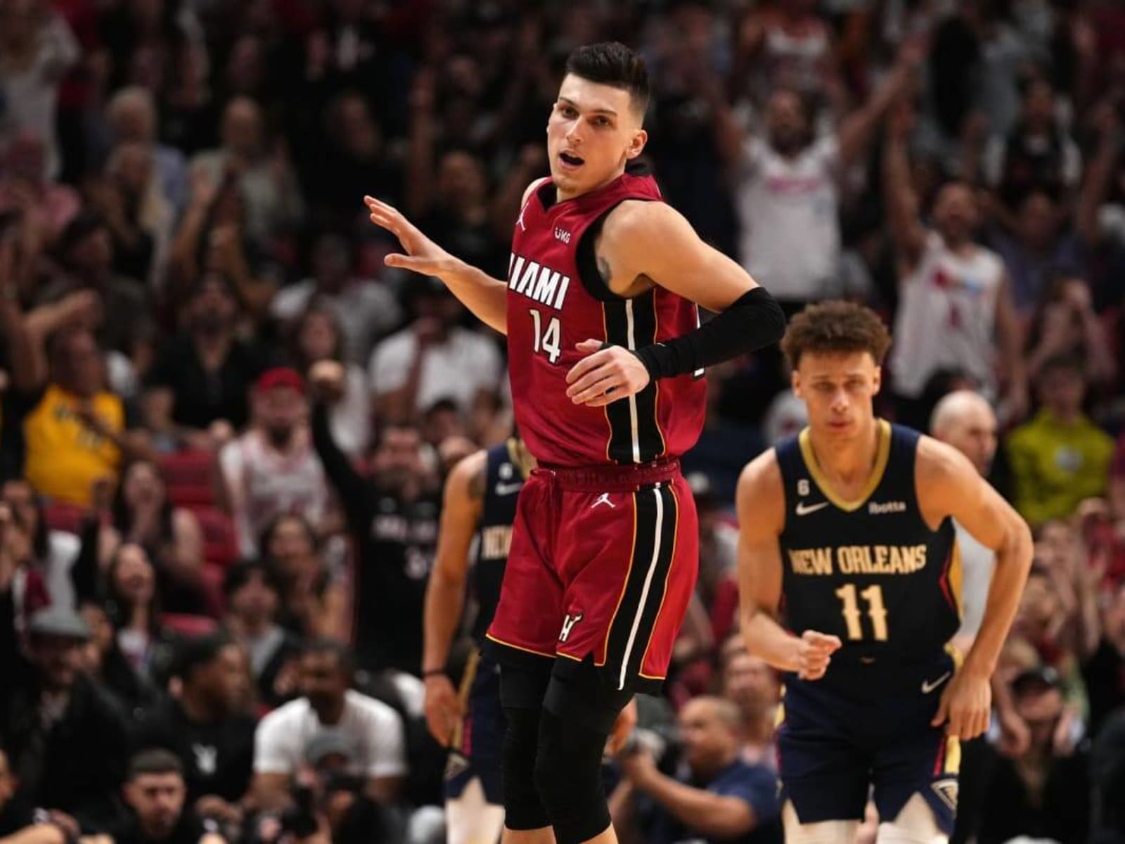 Miami Heat basketball player Tyler Herro throws out a ceremonial first  pitch before a baseball game between the Pittsburgh Pirates and the  Milwaukee Brewers, Saturday, Aug 5, 2023, in Milwaukee. (AP Photo/Jeffrey