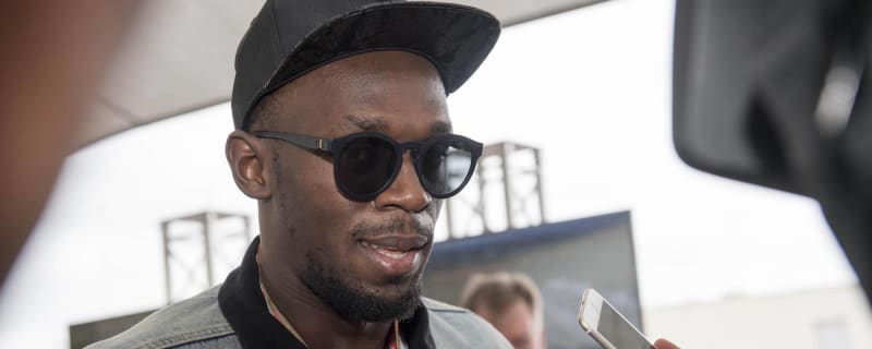 Usain Bolt aims a dig at Arsenal fans over Premier League title