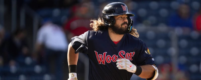 Jorge Alfaro of the San Diego Padres walks to the duguout after