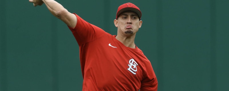 Cardinals reliever Gallegos gets wiped down by umpire after using rosin bag  on his left arm