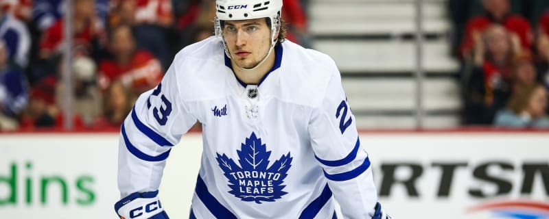 Maple Leafs’ Matthew Knies fights Golden Knights’ Zach Whitecloud after opening faceoff