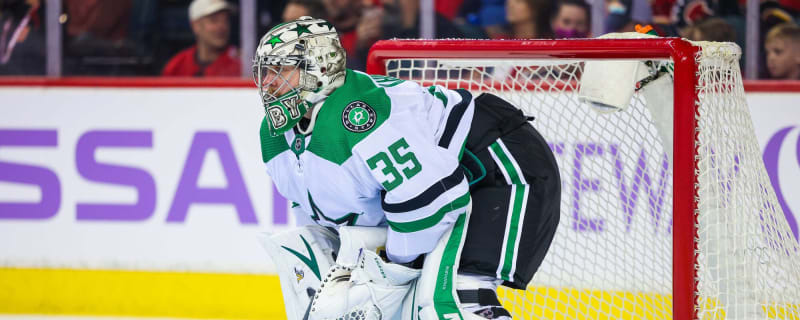 Houston Aeros Goalie Anton Khudobin (30) clears the puck to a team