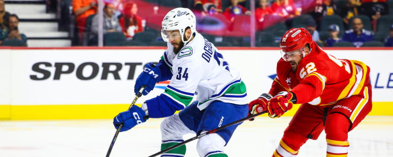 Canucks assign trio of players to AHL