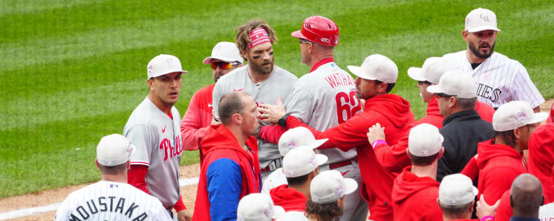 Watch: Phillies' Bryce Harper ejected for charging Rockies dugout as benches clear