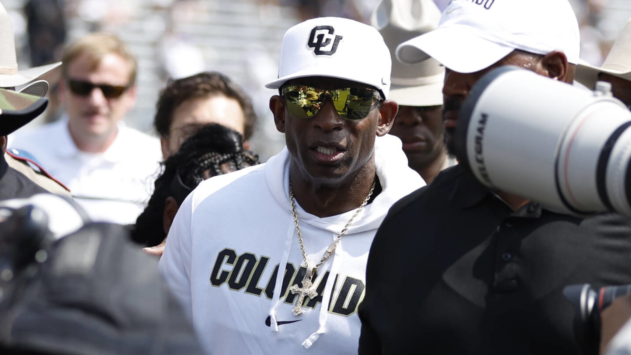 Deion Sanders makes most of rival coach's comments about him always wearing  sunglasses and a hat