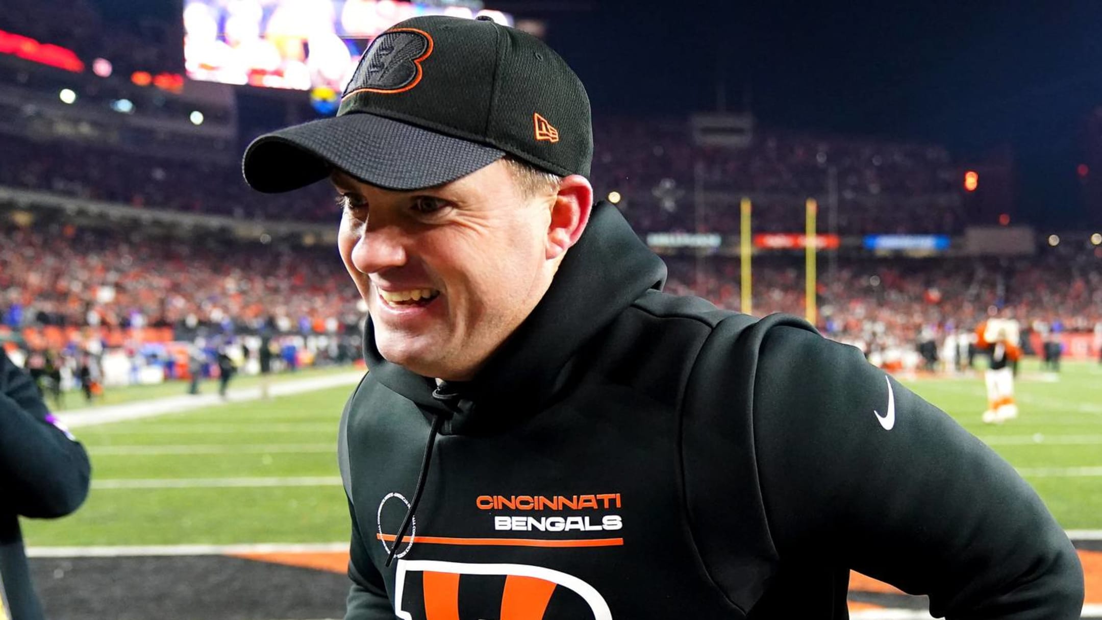 Bengals coach Zac Taylor delivers game ball to fans at a bar