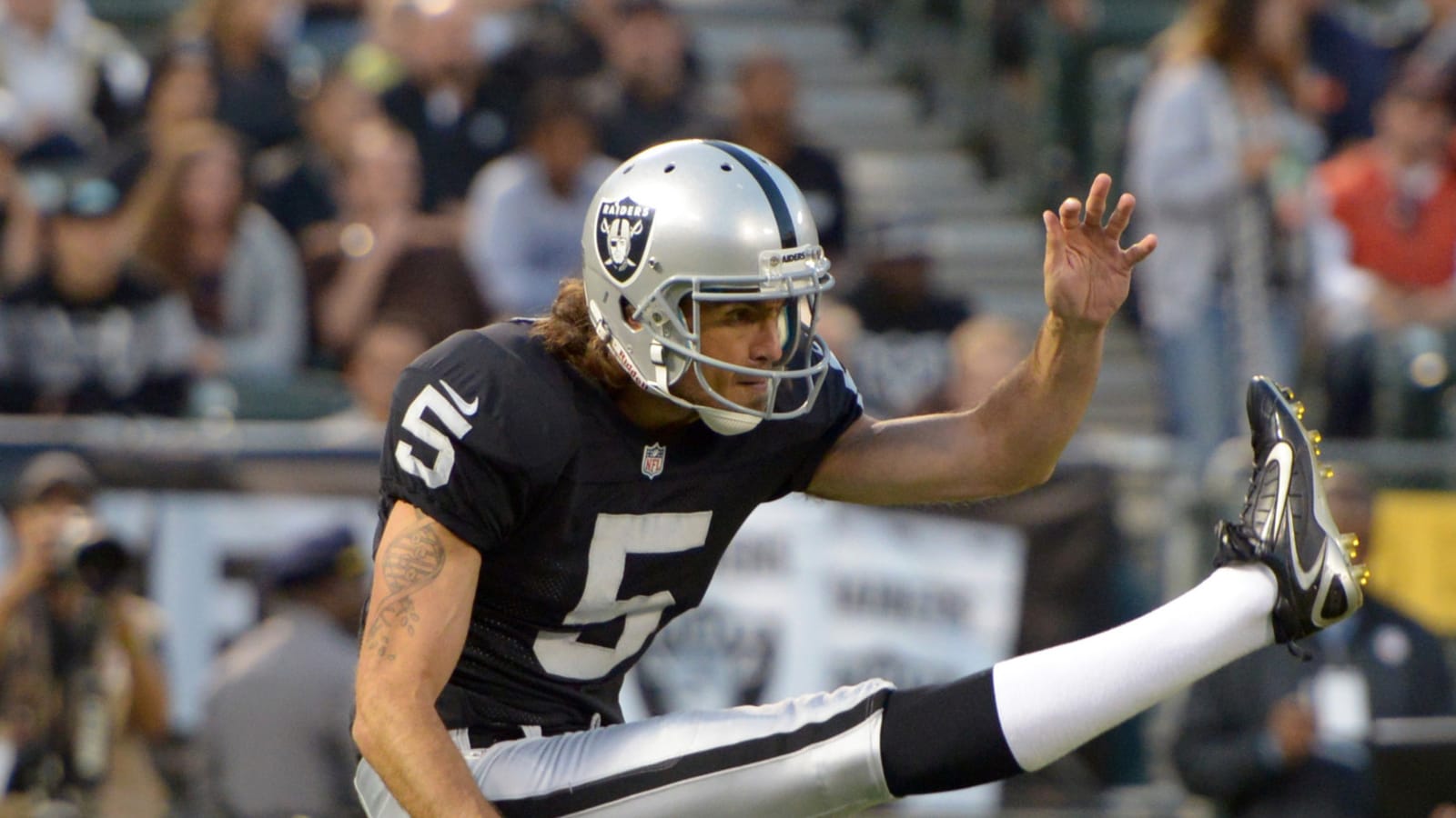 Ex-NFL punter claims he was fired over his anti-MAGA protest