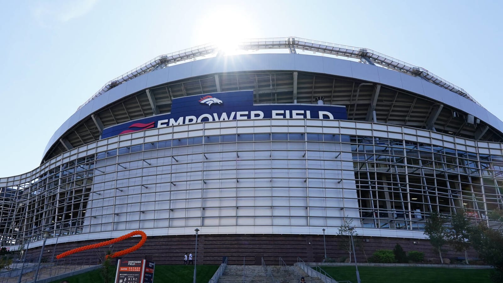 Denver Broncos stadium Empower Field at Mile High on fire as dark clouds of  smoke billow from building