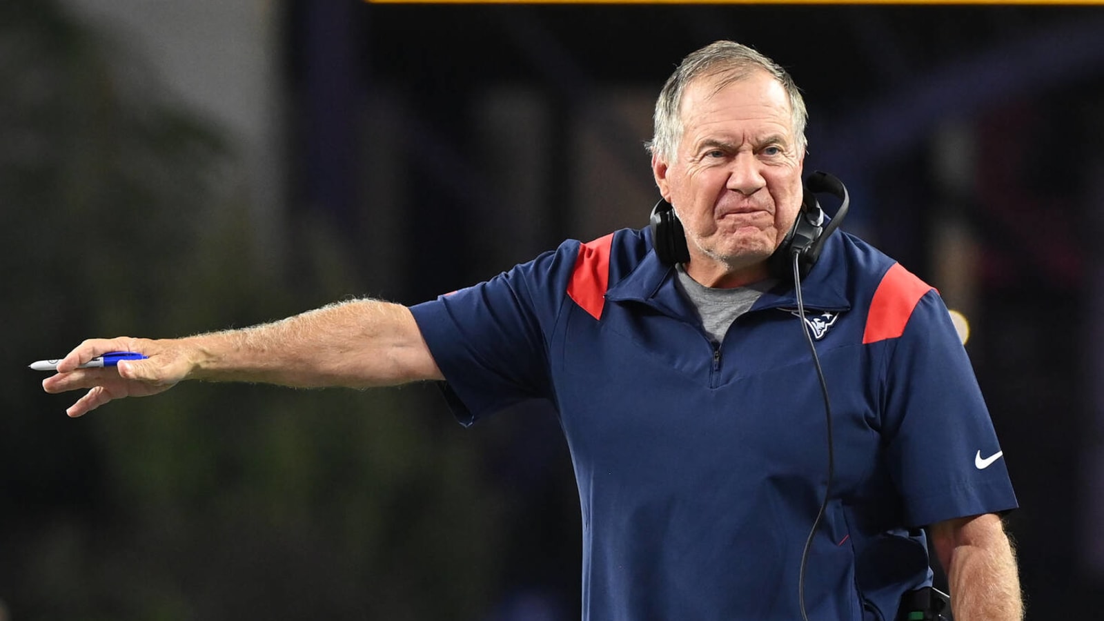 Belichick cracks smile when presented with UFC championship belt