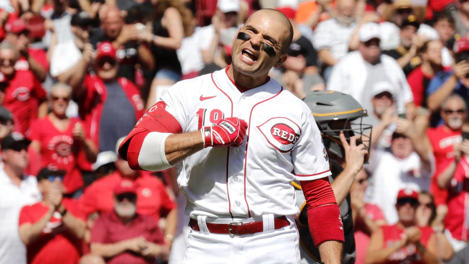 Joey votto Cincinnati Reds Unsigned Hitting in White Jersey Photograph