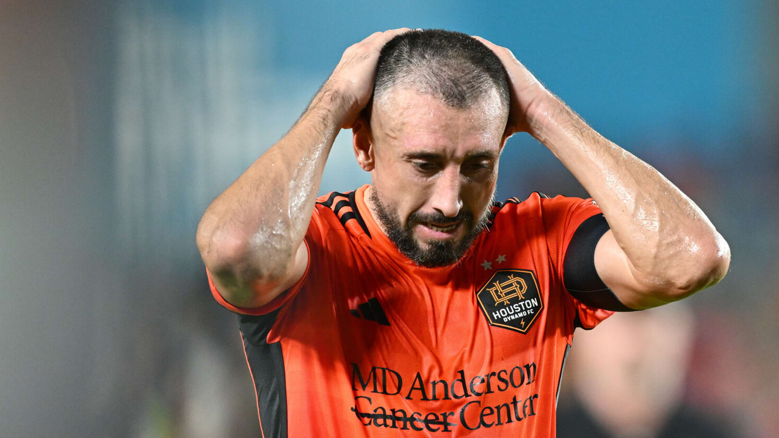 Dynamo captain sent off from playoff game for spitting at referee