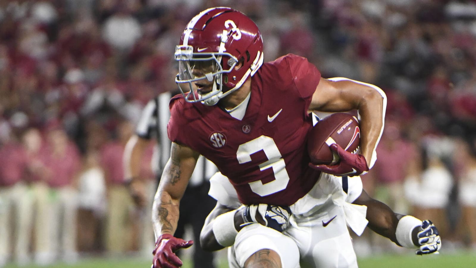 Video appears to show Alabama WR smack woman