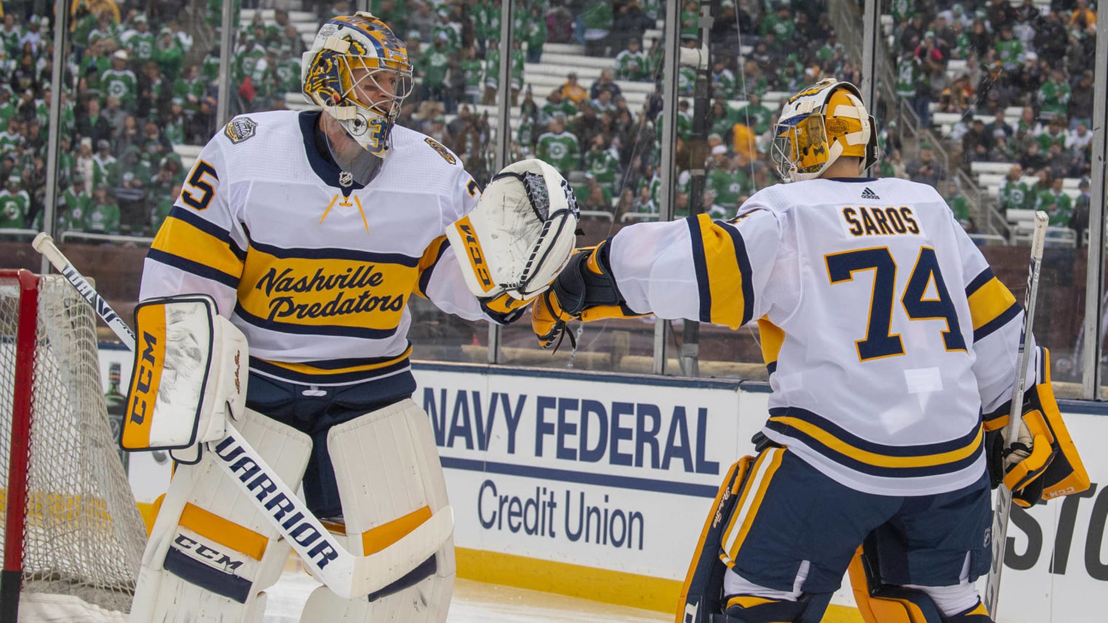 Nashville Predators goaltender Juuse Saros (74) takes a drink in