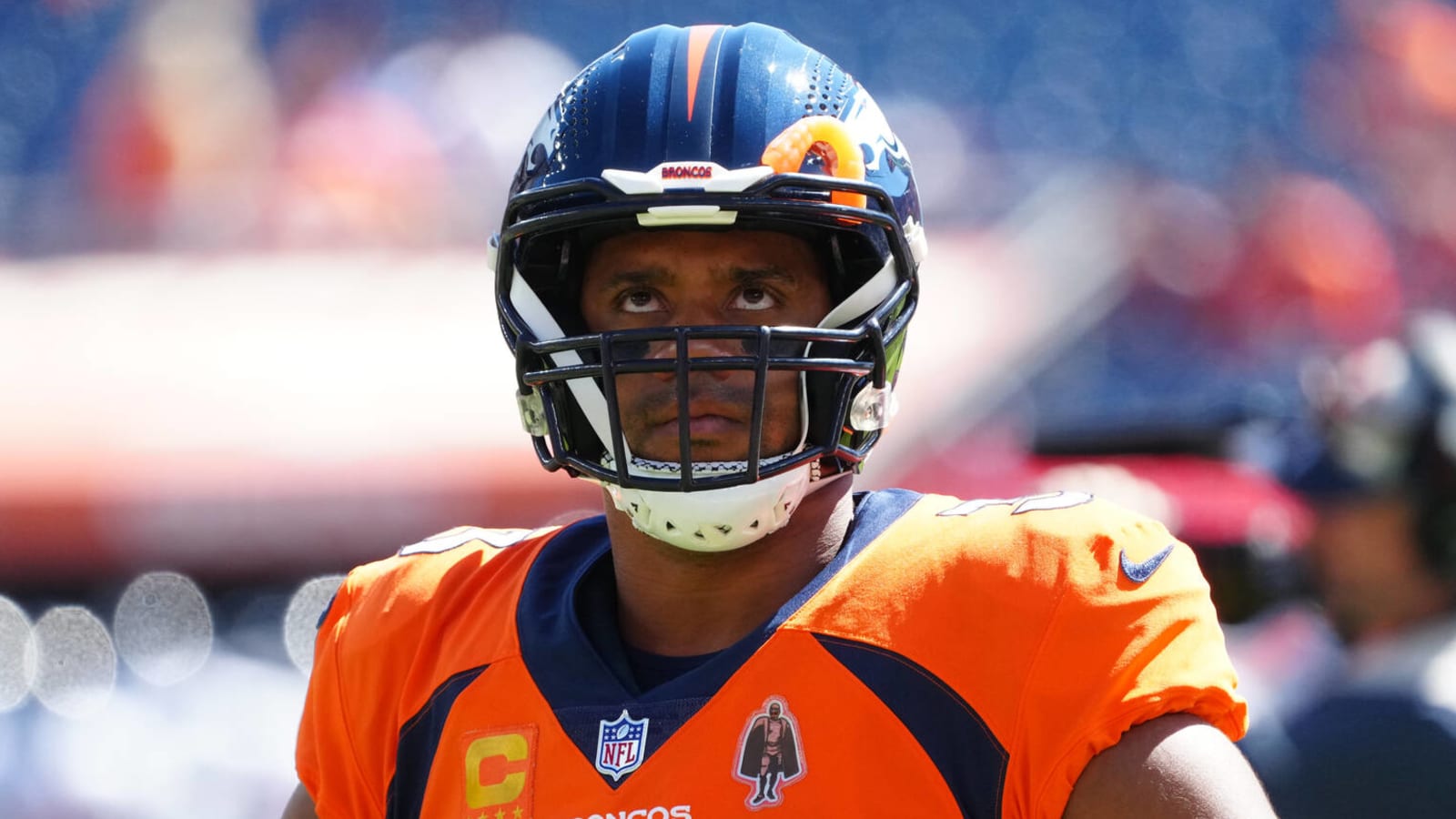 Broncos QB Russell Wilson dealing with partially torn lat