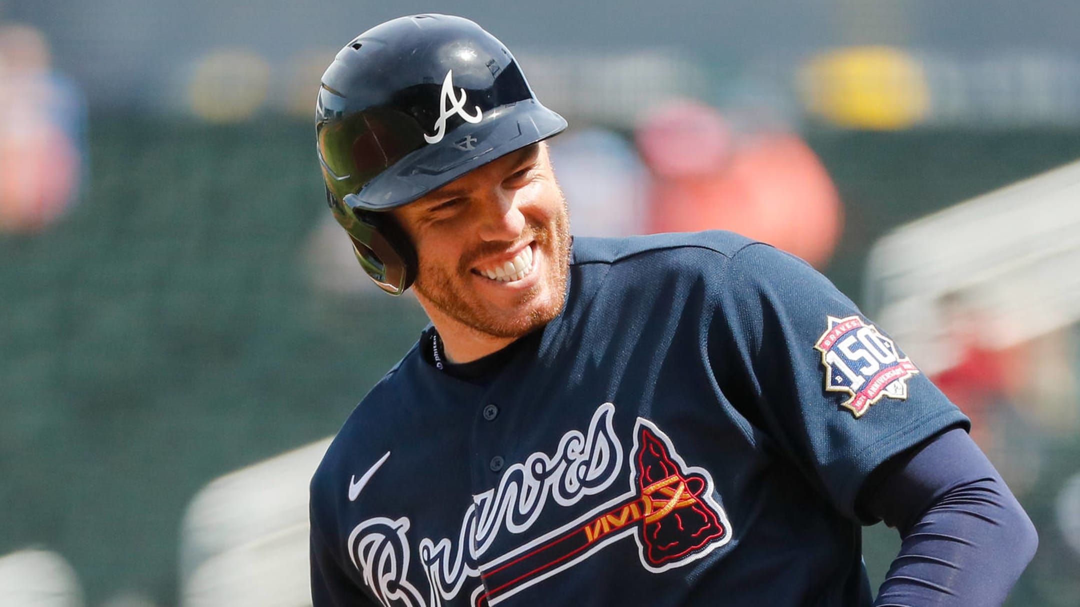 Baseball player Freddie Freeman surprises a young Phillies fan who