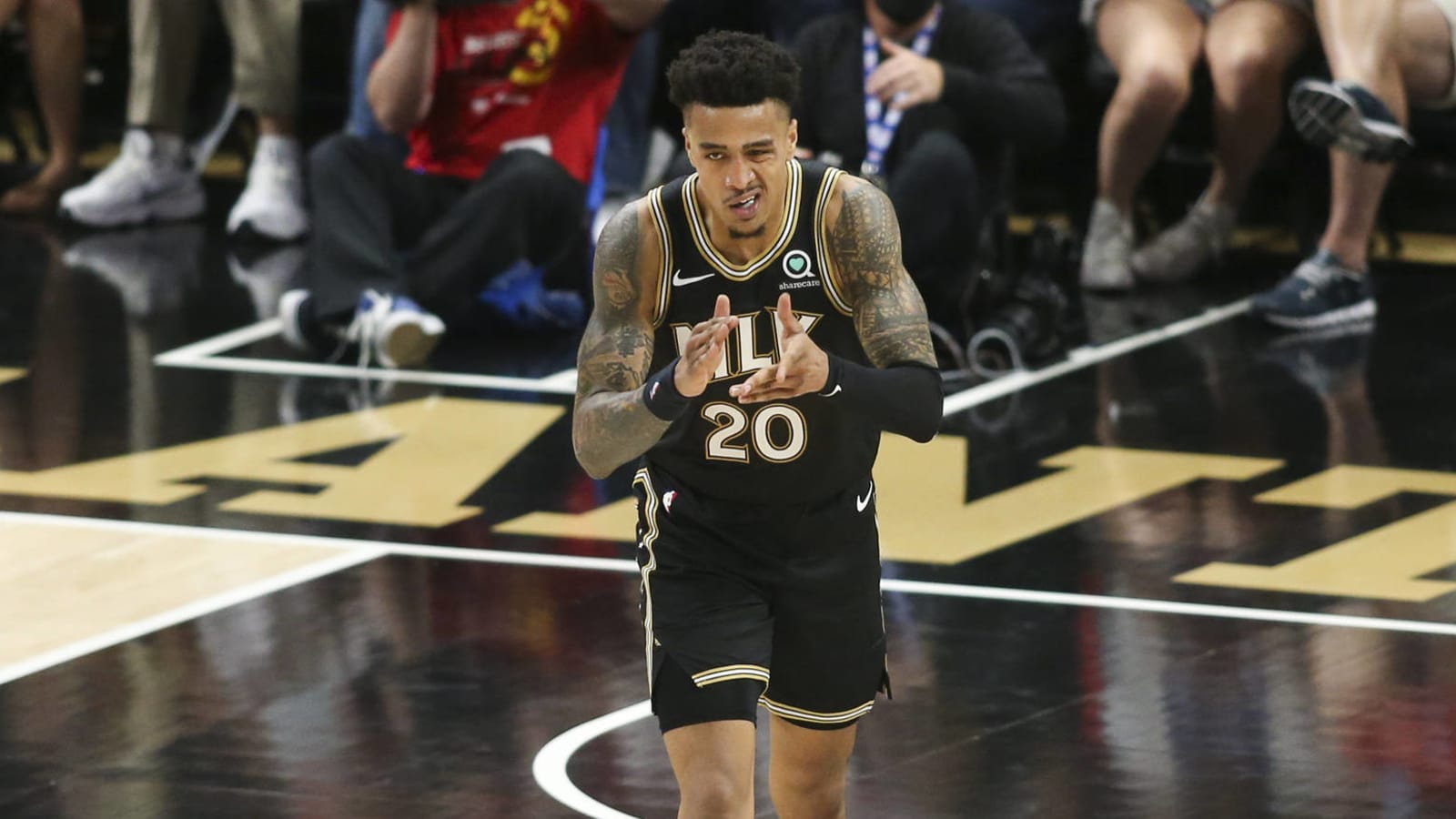 Hawks issue qualifying offer to John Collins