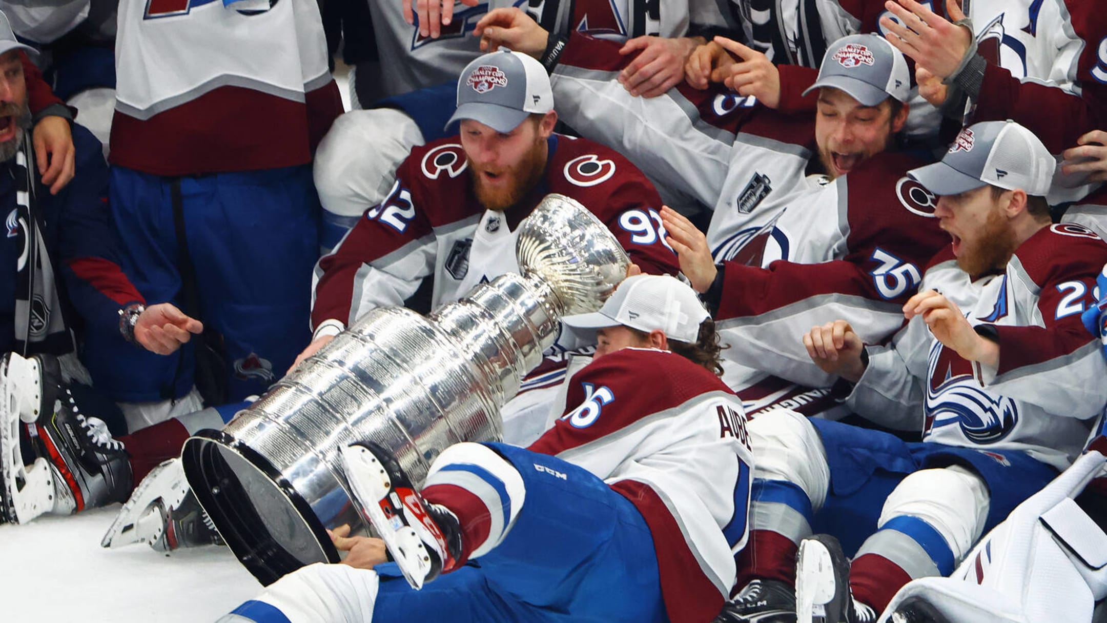 How tall is the Stanley Cup and how much does it weigh?