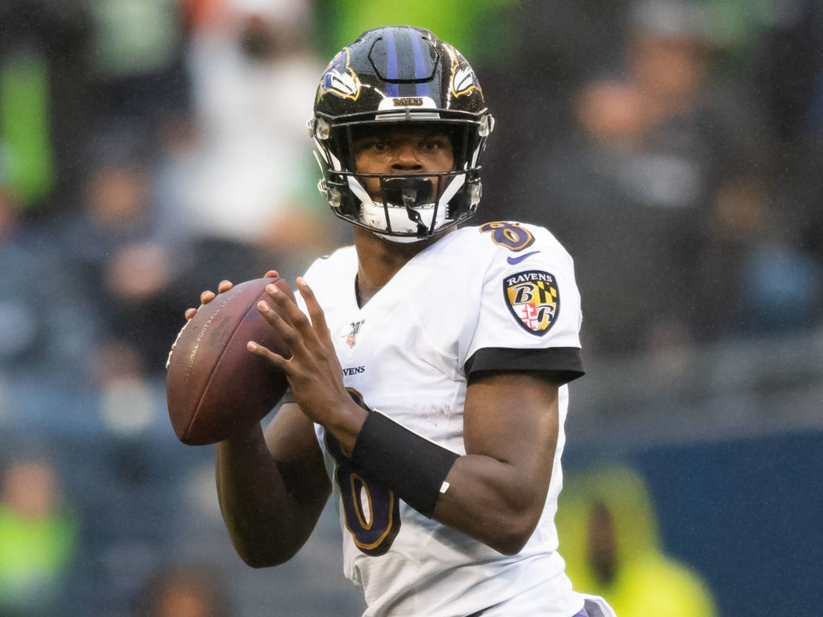 Jackson runs past Vick, effort wasted in brutal Ravens' loss