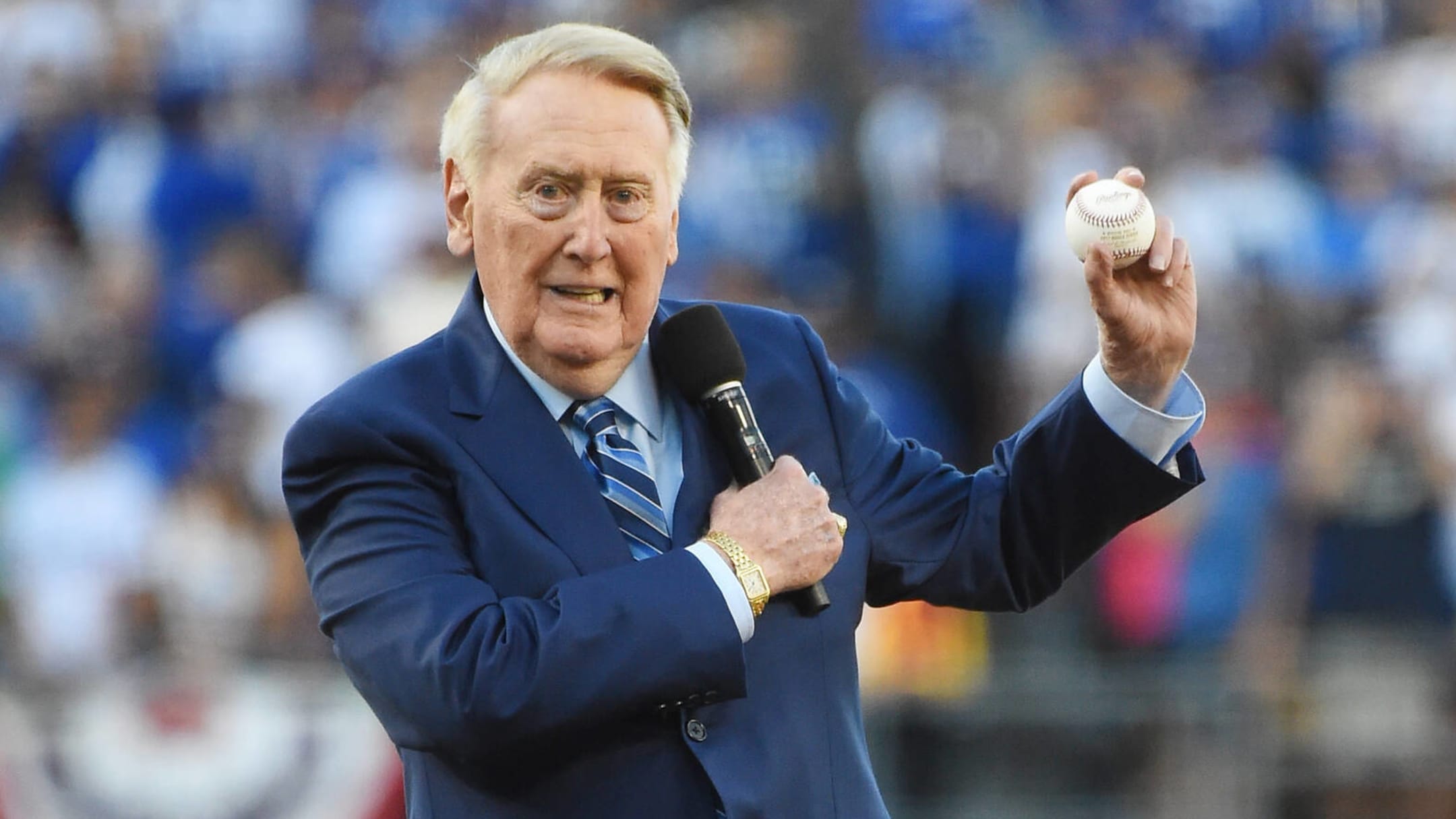 A patch honoring broadcaster Vin Scully is shown on the jersey of