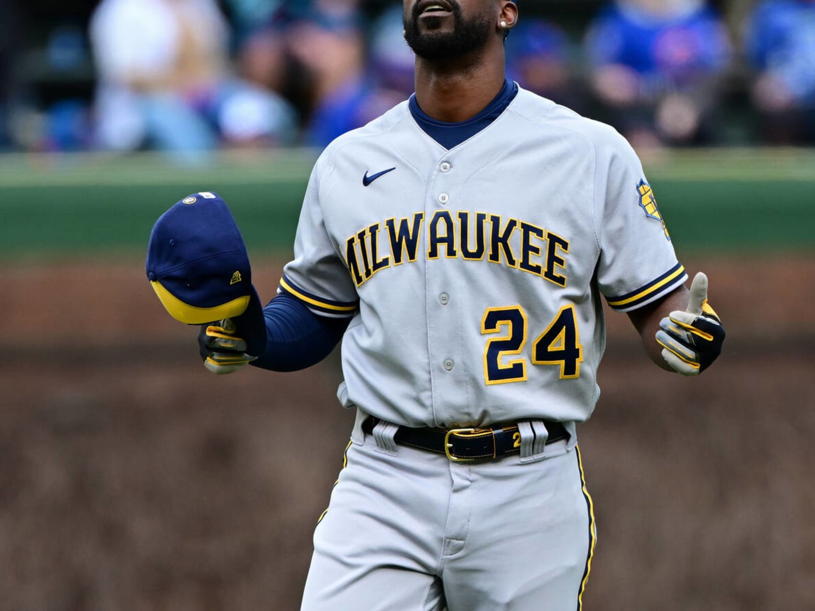 Milwaukee Brewers' Andrew McCutchen wears a Roberto Clemente No. 21 patch  on the back of his helmet during the fifth inning of a baseball game  against the Chicago Cubs, Thursday, April 7