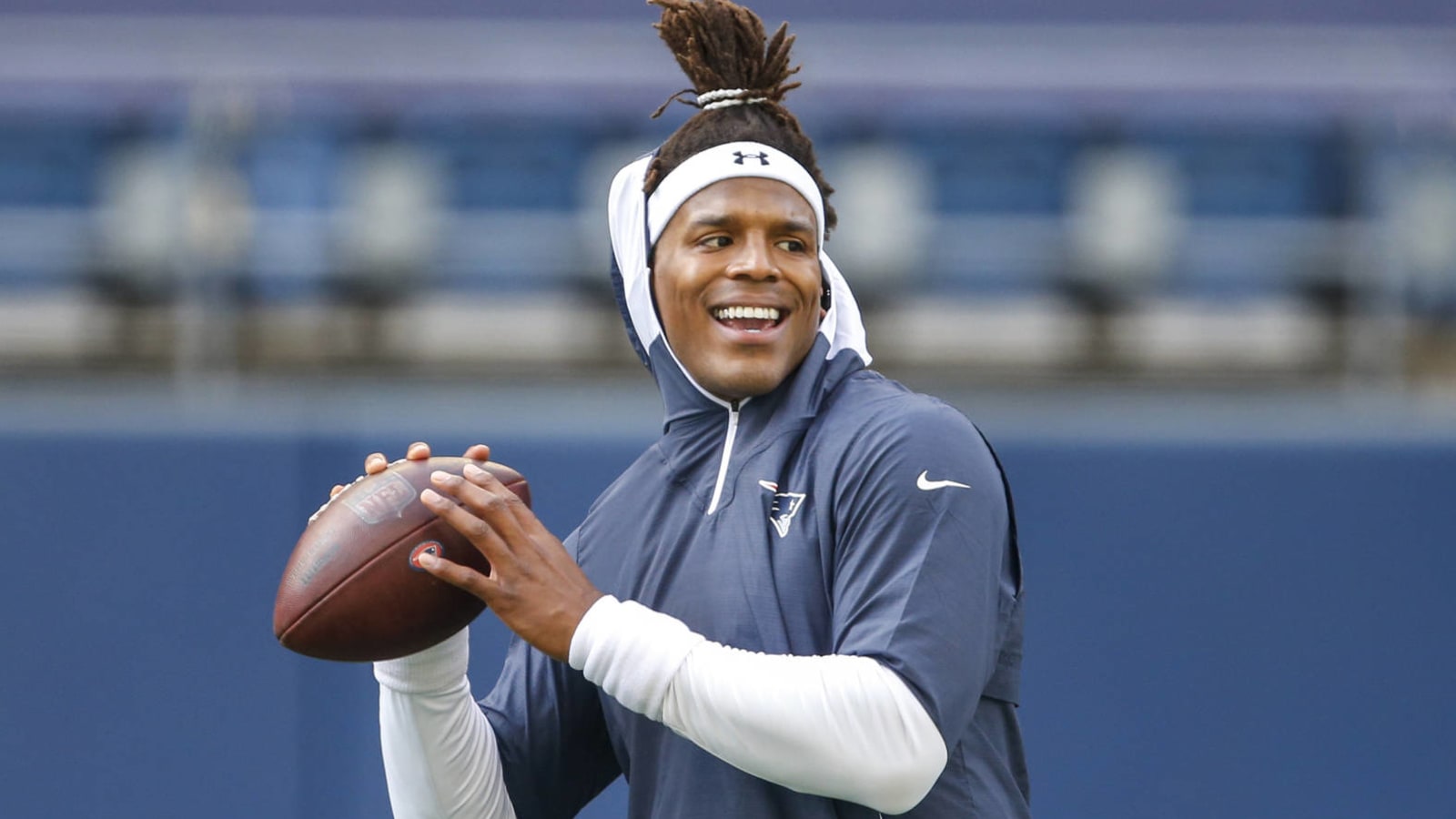 Newton downplays contract talk, praises Patriots