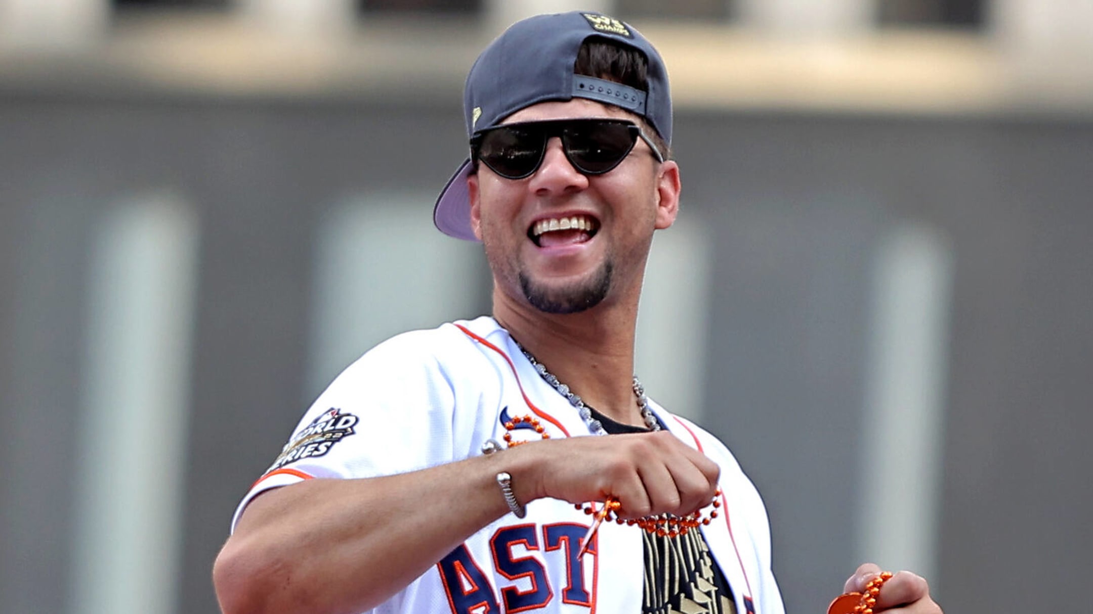 Miami Marlins first baseman Yuli Gurriel, right, is presented with