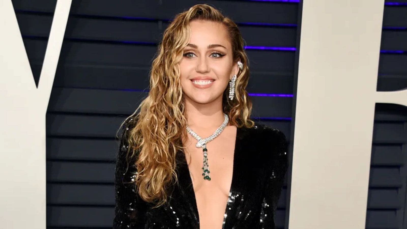 Miley Cyrus Reveals Her Mom Would Make Her Wear 250 Hair Extensions When She Was Young
