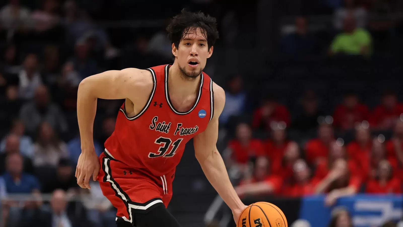 Red Flash forward Valentino Pinedo dribbles against Alabama State at UD Arena