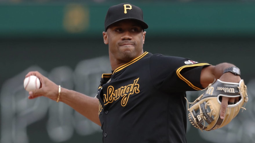 Russell Wilson throws a first-pitch strike at Pirates game