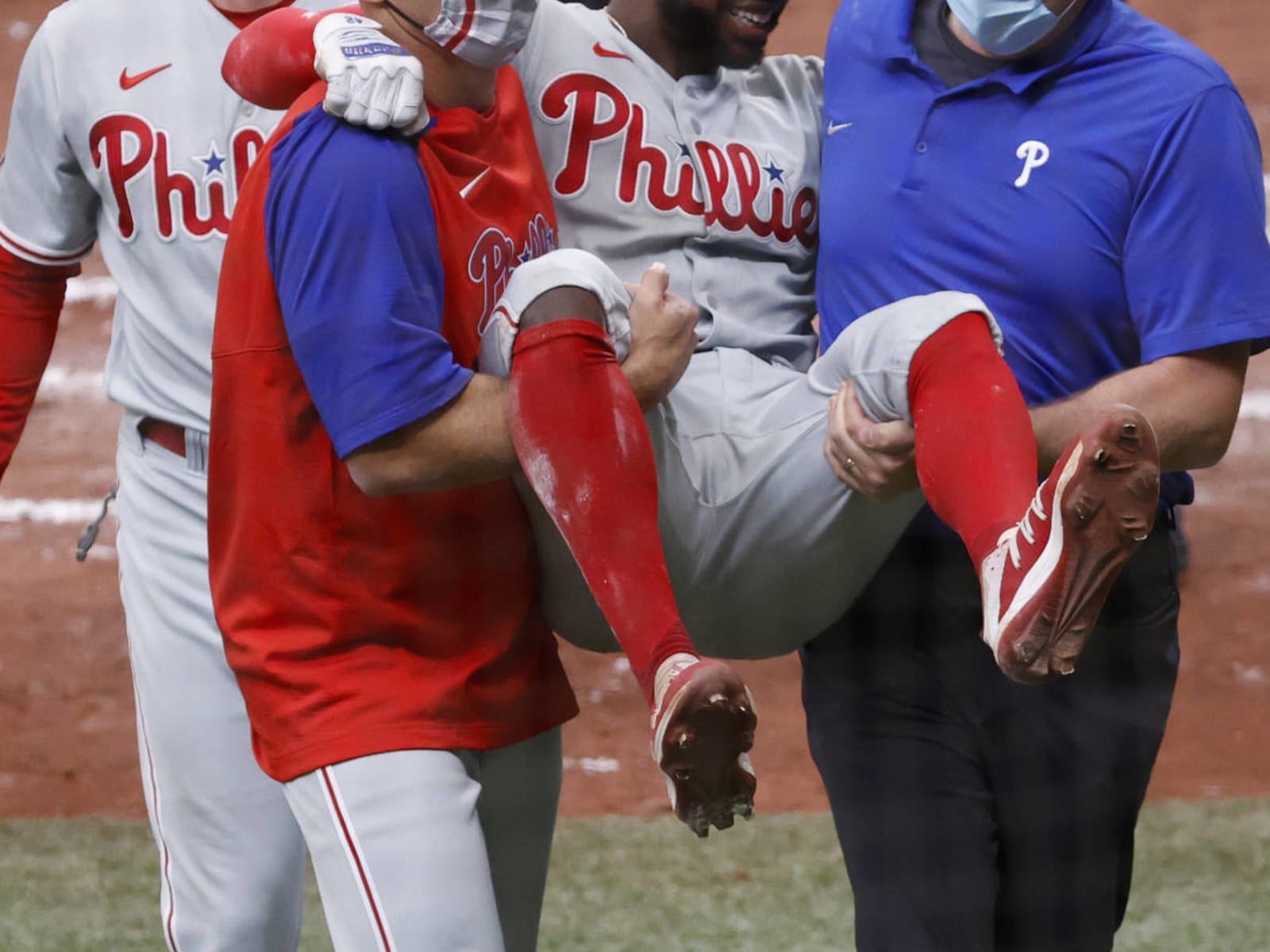 Phillies' Roman Quinn helped off the field with Achilles injury