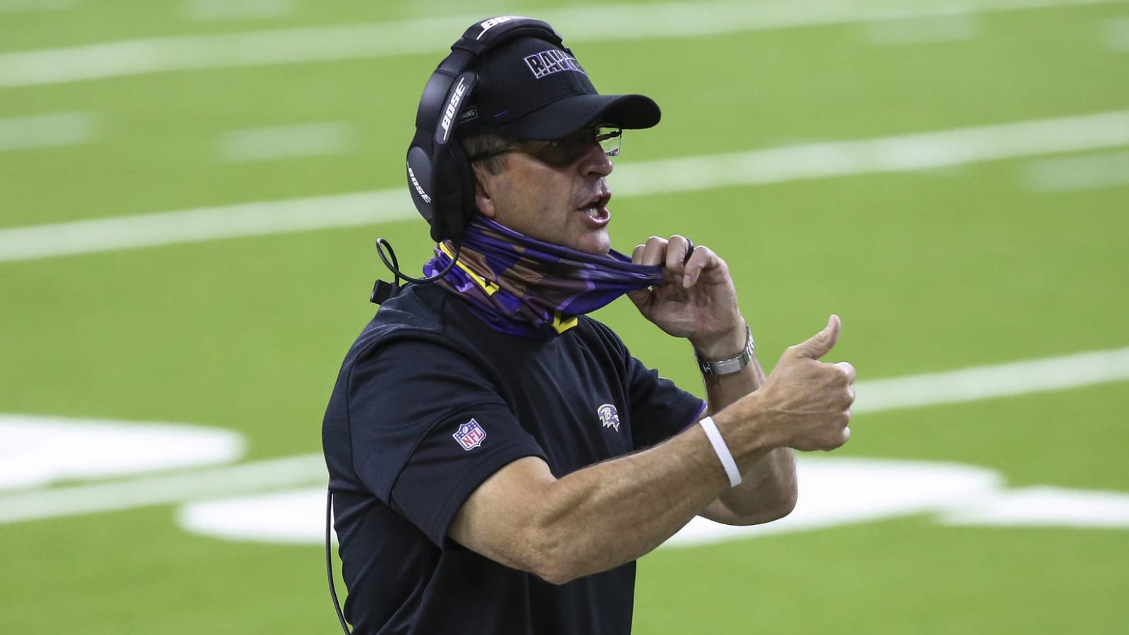 John Harbaugh plays coy after snubbing Mike Vrabel